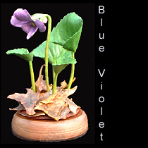 leather sculpture of violet flower