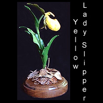 leather sculpture of yellow lady slipper orchid flower
